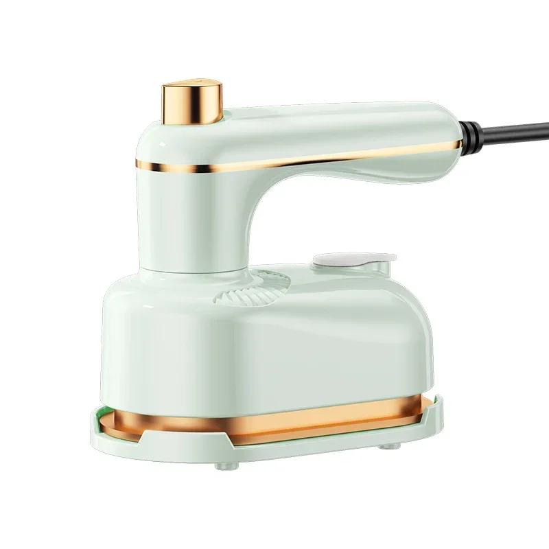 

Сухое и влажное глажение, двойной режим, большой объем резервуара для воды, мощный пар для одежды, укладка без складок, мини-портативная гладильная машина UK зелёный