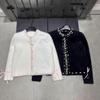 Xiangjia 2025 Autumn/Winter Pearl Knit Cardigan: Cozy, Age-Defying, and Versatile