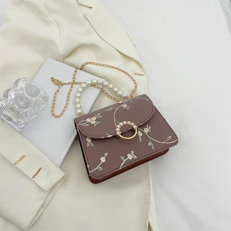 

Simple and fashionable pearl portable small square bag for women 2025 summer trendy new lace chain single shoulder oblique span small square bag коричневый