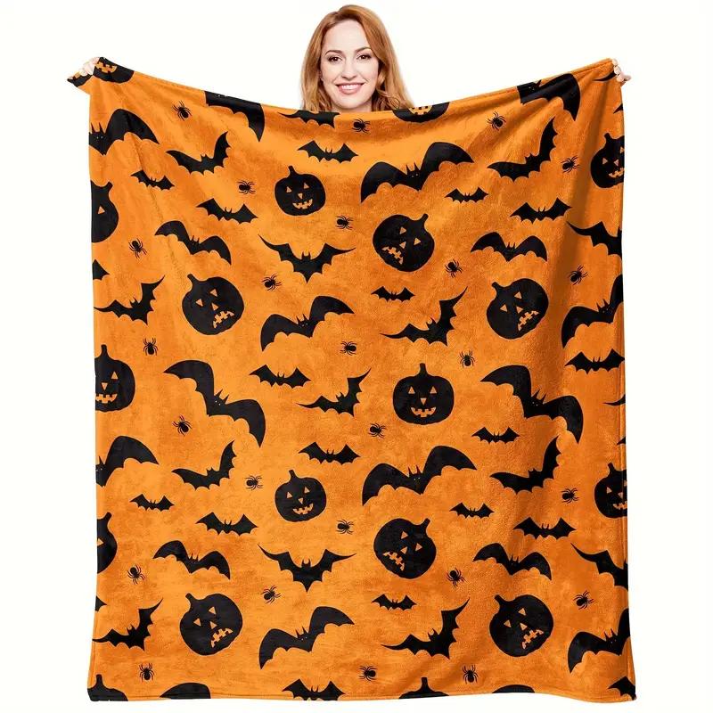 Cozy Halloween themed flannel blanket with bat and pumpkin print - soft, warm and lightweight for sofa, bed, travel and office 130x150cm