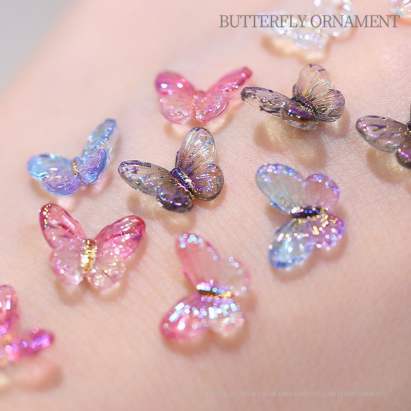 20 stuks vlinder nagelkunst accessoires - nageldecoraties met iriserende en driedimensionale vlinders gemaakt van hars voor nagelkunst.