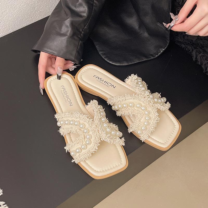 

Шлепанцы на плоской подошве, женские, весенние, с мягкой подошвой, фея, универсальные, жемчужные, пляжные сандалии, летние новые модели 40 бежевый