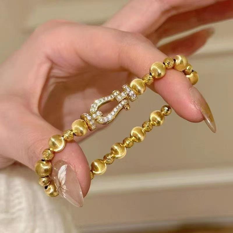 

Xiaohongshu popular French retro exquisite temperament versatile horseshoe buckle cat eye bracelet light luxury high-end jewelry women