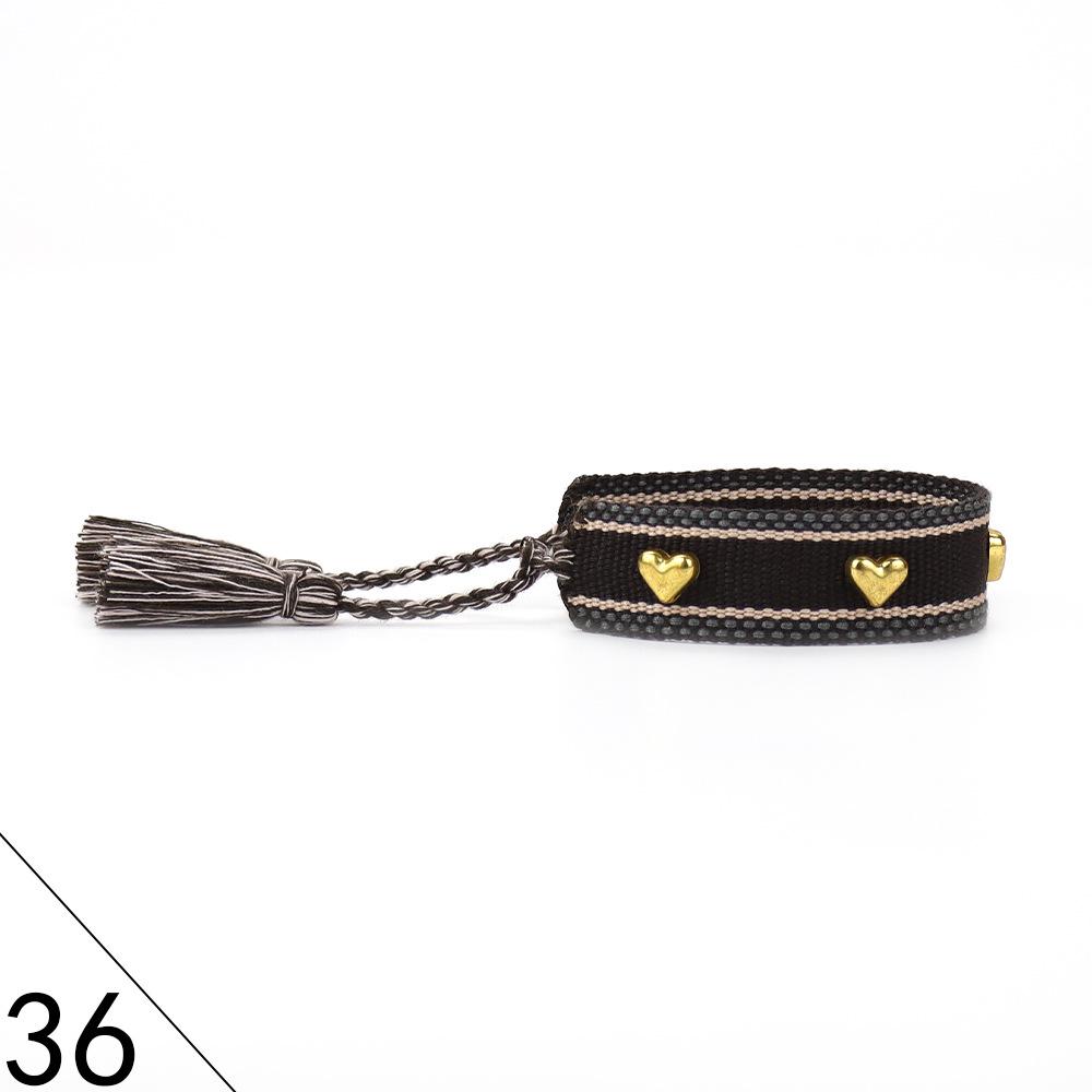 European and American Rivet Metal Heart Tassel Woven Bracelet for Women
