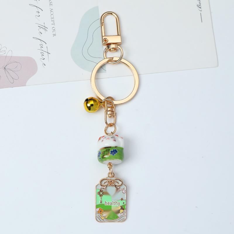 Golden Lucky Cat Bell Keychain – Ceramic Japanese Charm & Metal Pendant Ornament