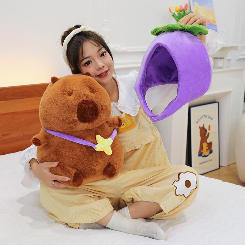 New lotus eggplant hat backpack capybara doll ugly cute kapibara dolphin boy plush toy grab machine