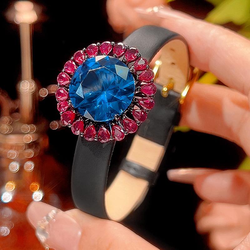 Autumn and winter new Huabi jewelry copper bottom gold-plated simulation blue spinel advanced sense black gold set main stone 16-10m