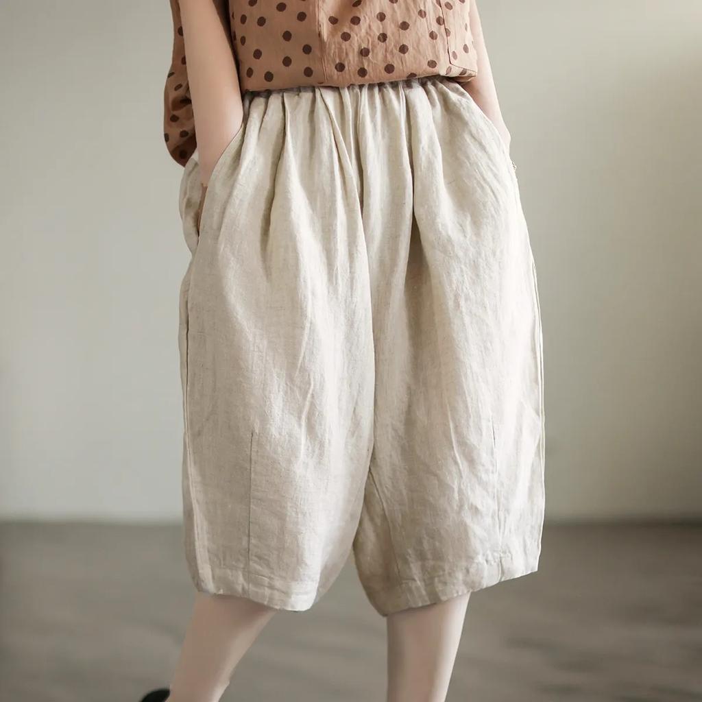 Pantaloni semplici casual da donna estivi in cotone e lino retrò letterario a tinta unita con elastico in vita taglia grande pantaloni a cinque punti