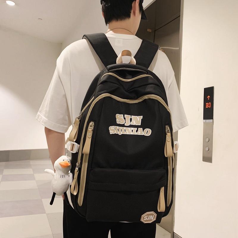 

Backpack Large capacity schoolbag Female junior high school student High school student Versatile simple backpack New чорний