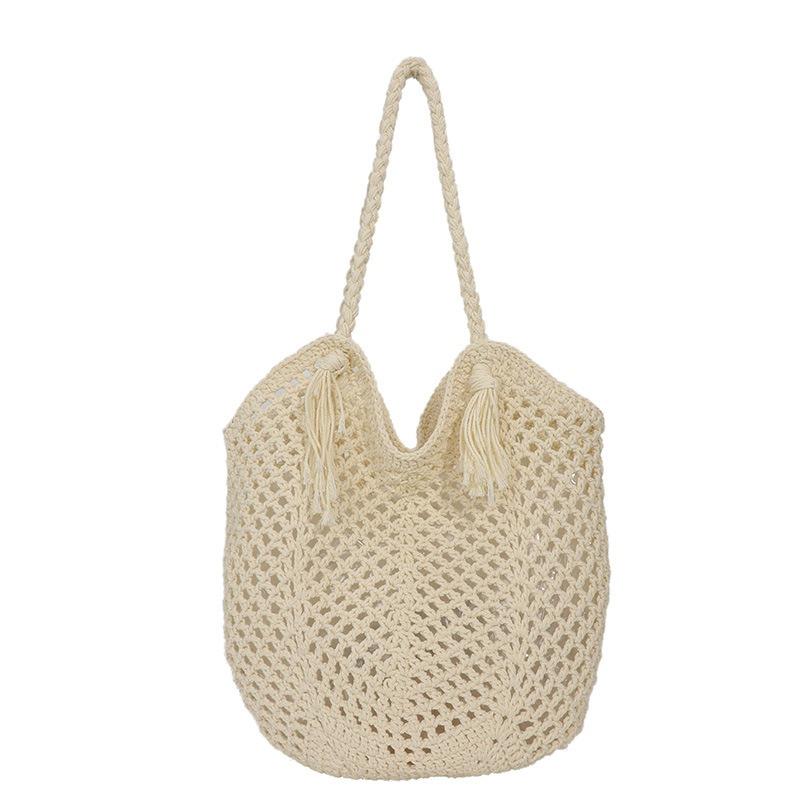Hollow knitted bag women's large-capacity new summer shoulder knitted bag seaside vacation beach bag