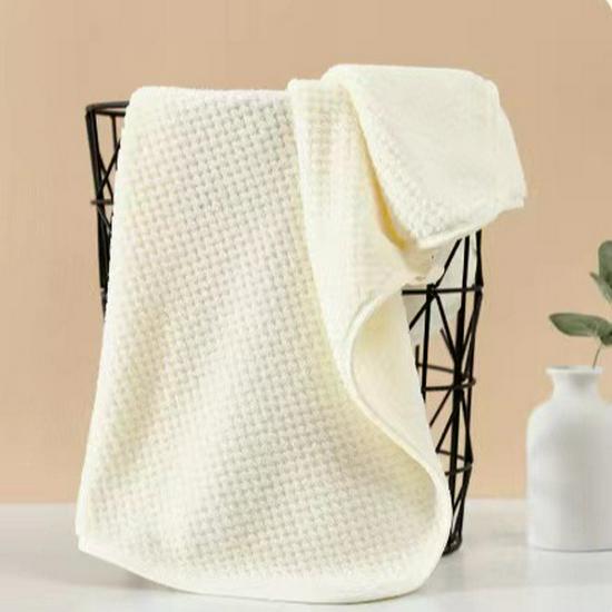 Soft Coral Fleece Towel Set: Absorbent Pineapple Grid Design for Kids, Face, and Bath.