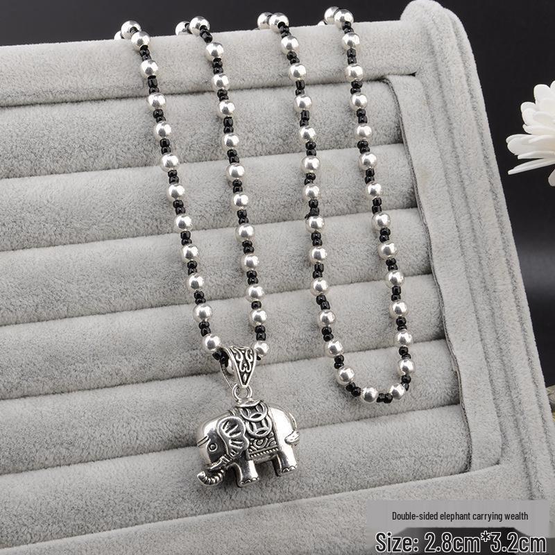 

Тибетське срібло Чотири сторони світу Багатство Китиця Підвіска Кольє