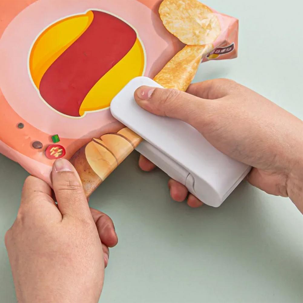 Handlicher Vakuumierer Schneller Beutelversiegler Tragbarer Mini-Wärmebeutelversiegler Handheld-Vakuum-Clip-Maschine für Snackverpackung Lebensmittel