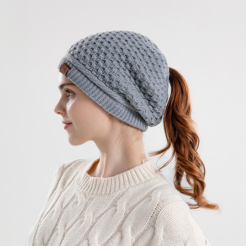 Autumn and Winter Warm Ear Protection Pullover Hat Women's Hat Ponytail Hole Knitted Hat European and American Wool Hat Tide