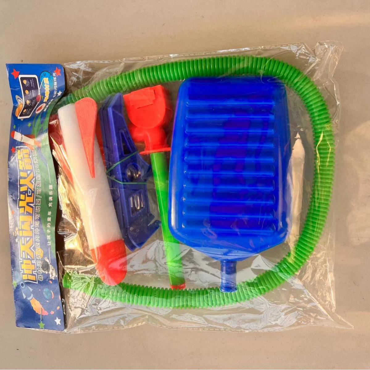 

Детская игрушка-ракетница с пневматическим приводом для игр на открытом воздухе Rocket head with light