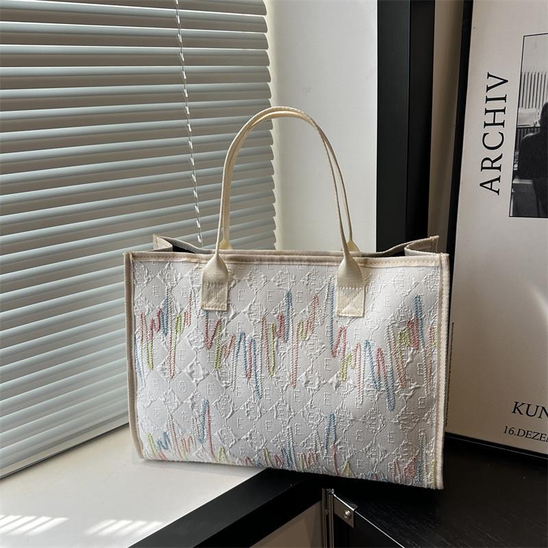 Fashionable Medium Sized Womens Tote Bag With Soft Structure And Interior Pockets