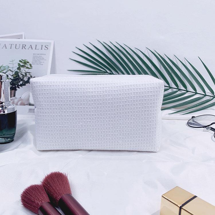 Trending Waffle Cosmetic Bag: Solid Color, Spacious, Women's Handheld Toiletry Organizer