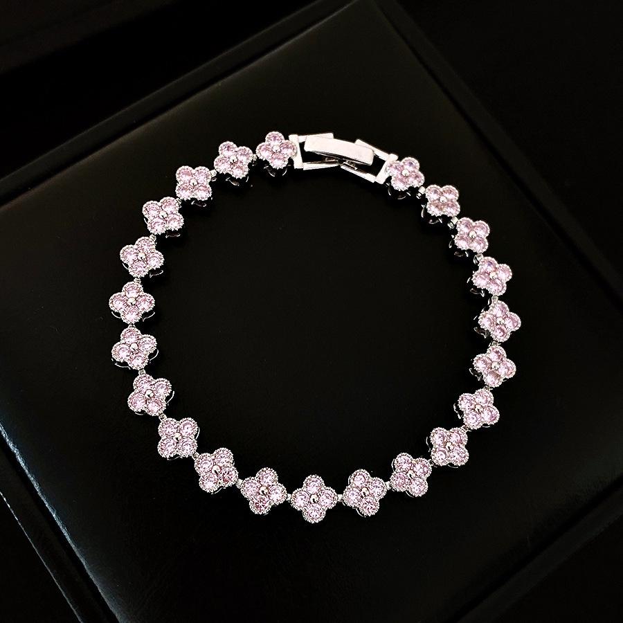 Pink Diamond Zirconia Starburst Flower Bracelet: Trendy, Luxurious Jewelry with Unique Design.