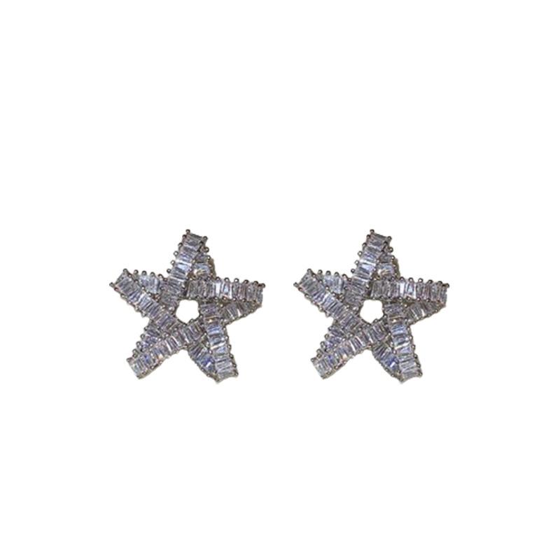 Silver needle zircon star hollow earrings, European and American exaggerated design studs, niche cold wind temperament earrings