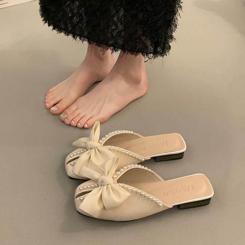 Korean version of bow-tied cool slippers for women's summer wear 2025 new versatile pearl bag head half slippers flat-bottomed lazy shoes