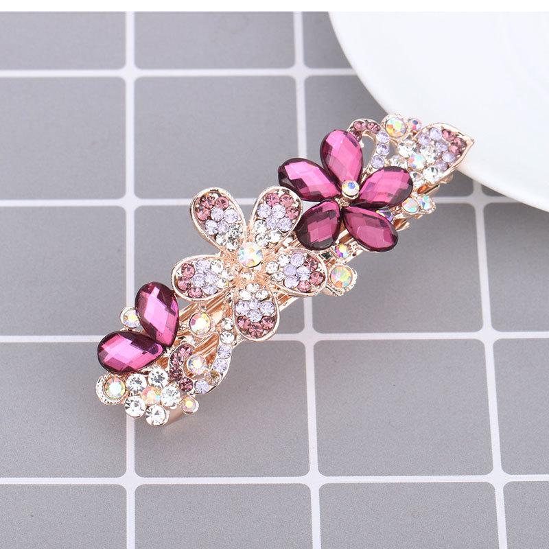 Mengpei Large Crystal Flower Hair Clip: Elegant Rhinestone Ponytail Accessory for Women.