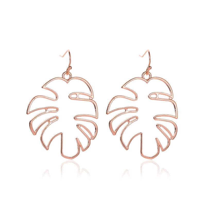 Ethnic Style Retro Hollow Leaf Stud Earrings - Banana Leaf Design for Women