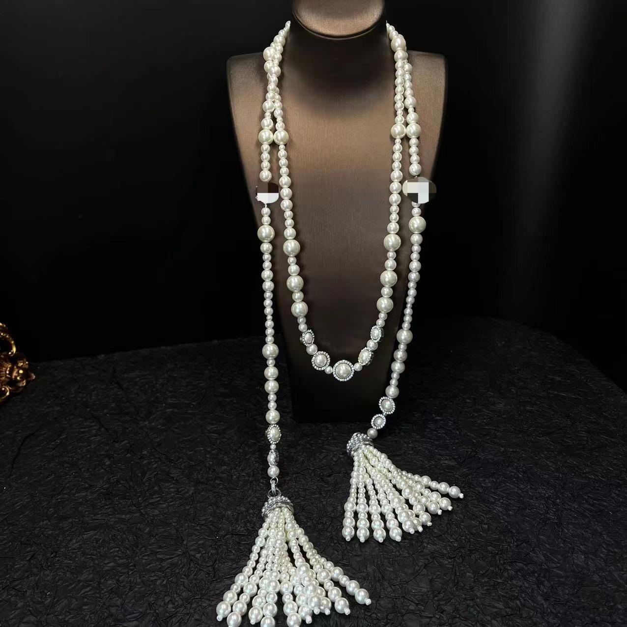 

Middle French Style Small Fragrance Shihua Pearl Tassel Necklace Light Luxury High-end Niche Design Sweater Chain Waist