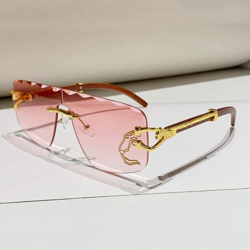 

Женские солнцезащитные очки необычной формы с цельными безрамочными линзами и волнистыми краями