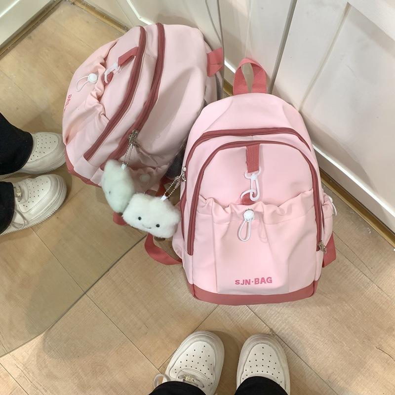 Рюкзак Новый корейский вариант повседневного нейлонового рюкзака Высокая ценность женская модная студенческая сумка розовый