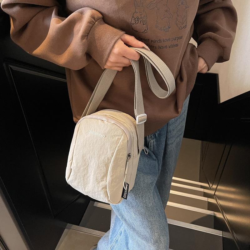 Versatile small bag Crossbody bag Women's casual canvas bag Light commuter cloth bag Men's mobile phone bag