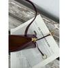 2025 neue Sommer- und Herbst-Clip-Tasche Französische Nischen-Leder-Schulter-Unterarmtasche Leder Retro-Mode Baguette-Tasche Damen