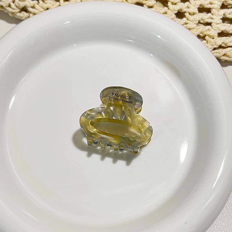 Acetate Floral Mini Claw Clip: Elegant Oval Hollow Design for High Ponytails & Side Styles