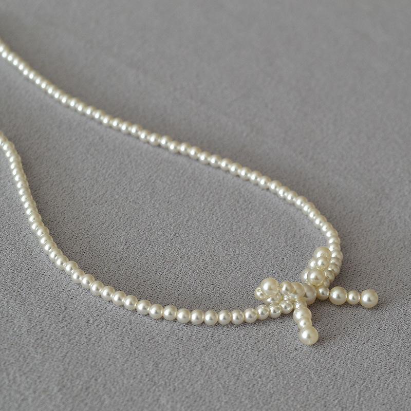 French Niche Elegant and Bright Imitation Shijia Pearl Bow Shape Simple Temperament Short Necklace Choker Woman