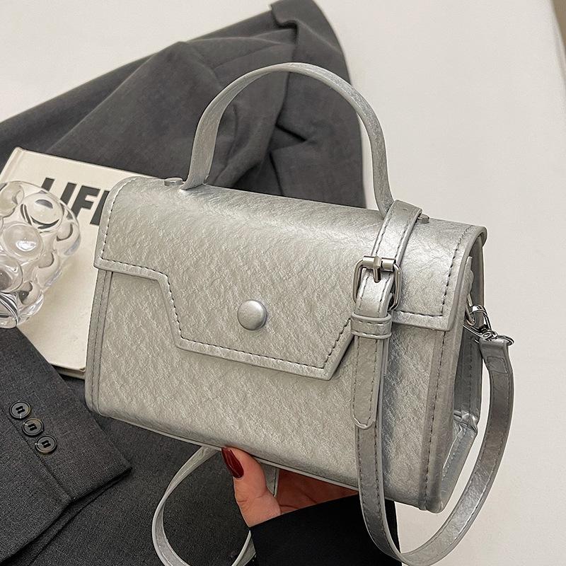 Wholesale new niche high-end sweet simple style solid color portable small square bag foreign style versatile commuter messenger bag
