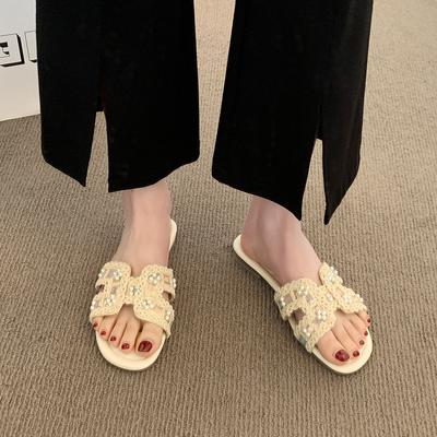 Super schöne flache, coole Hausschuhe für Frauen zum Tragen 2025 Sommer neuer Feenstil mit Rock Halbschlappen Strand-Badesandalen