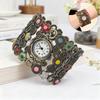 Montre Vintage en Alliage Rétro pour Femme Design Sculpté Motif Floral Bracelet Manchette Montre Montre-Bracelet Accessoires de Mode