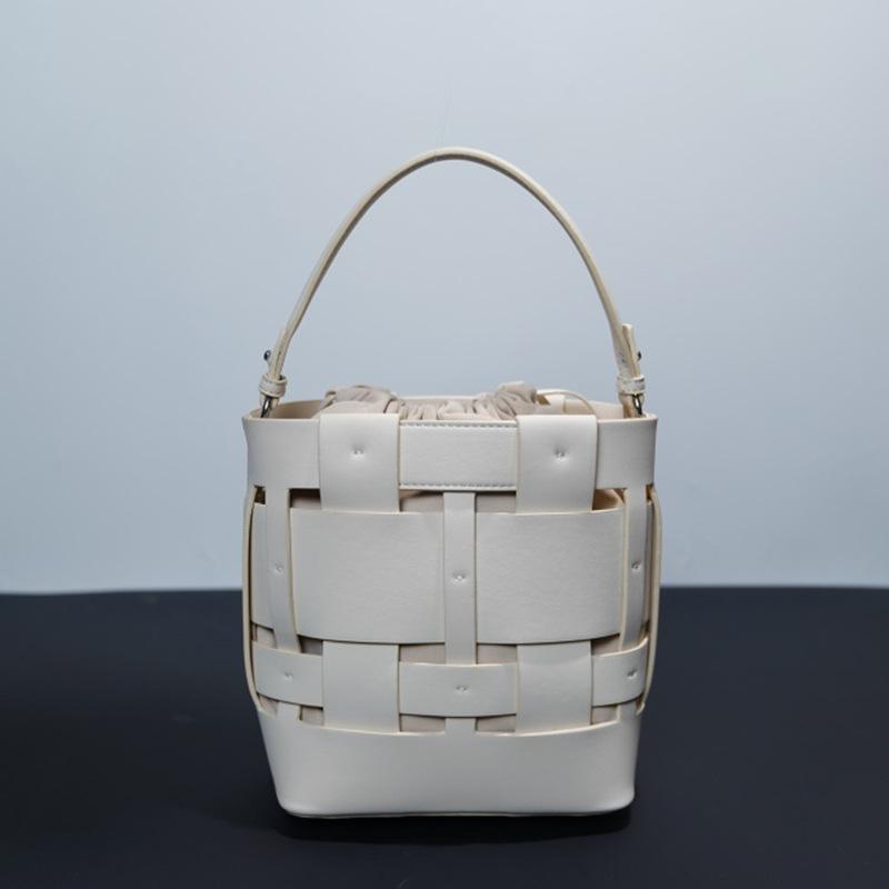 Genuine leather niche hollow design European and American fashion versatile woven handbag cowhide shoulder bag bucket bag crossbody