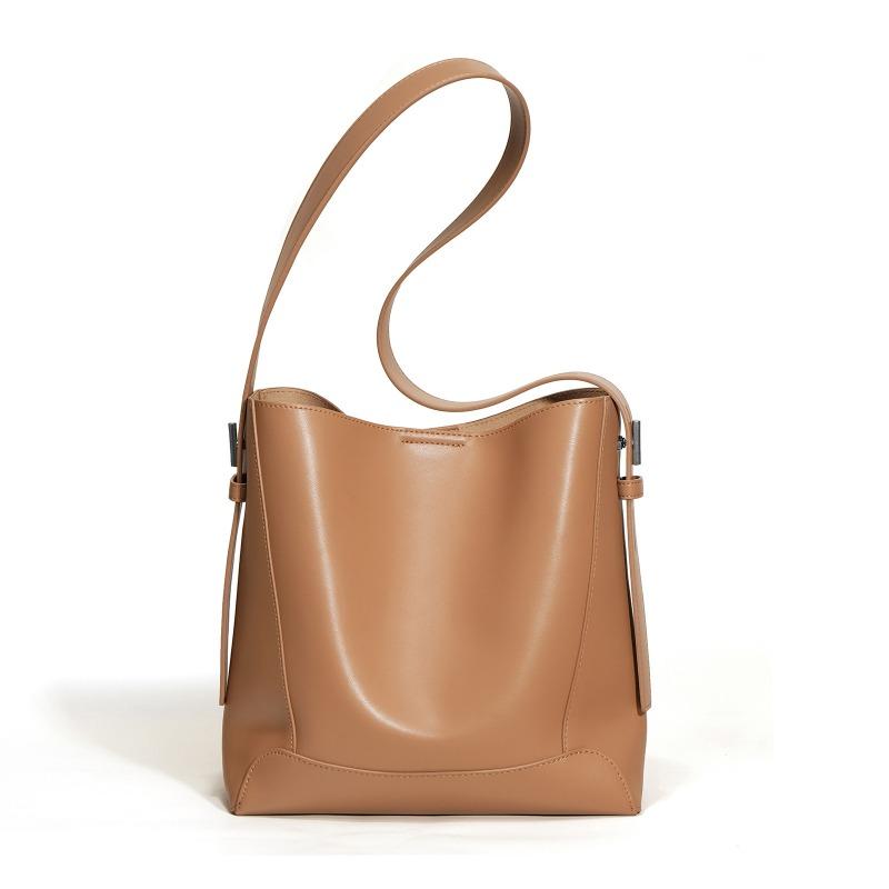 Cowhide bag women's versatile commuter bucket bag new leather women's bag high-end niche design shoulder bag