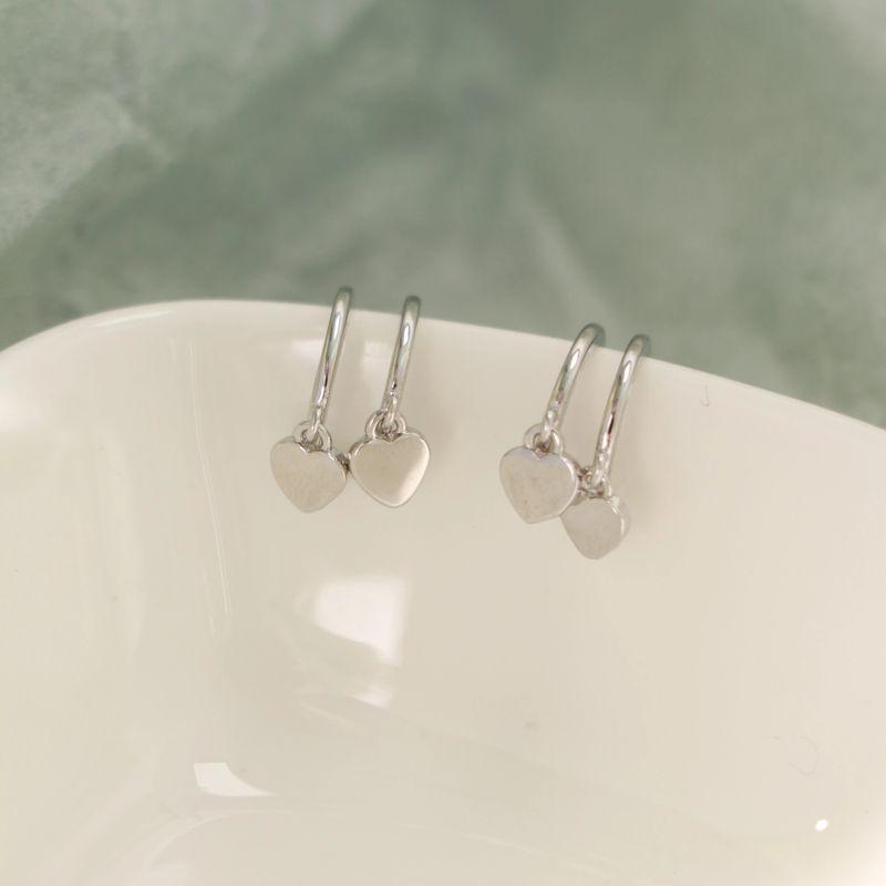 

to Lack of Sting Sterling Silver Needle Double Layers Loving Heart Earrings without Pierced Mosquito Coil Ear Clip Sweet Petite Earrings Niche Style A pair of double-ring Heart silver stud earrings