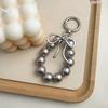 Korean Style Keychain Pendant: Metal Irregular Bow with Pearl Beads for Phone or Bag Accessories