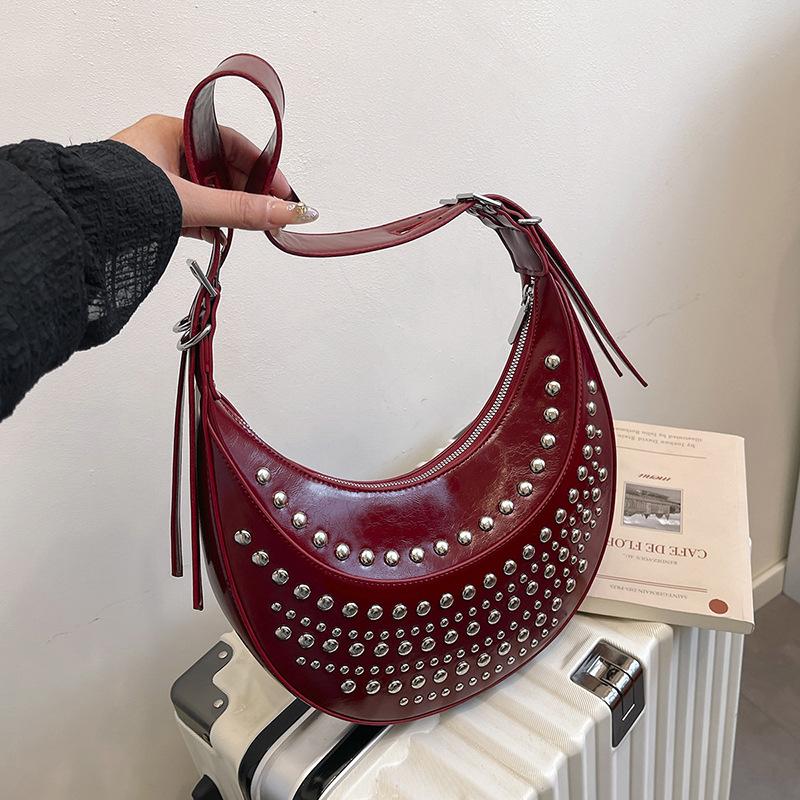 Women's bag 2025 new European and American fashion rivet punk style shoulder bag, large capacity shoulder hand, armpit bag
