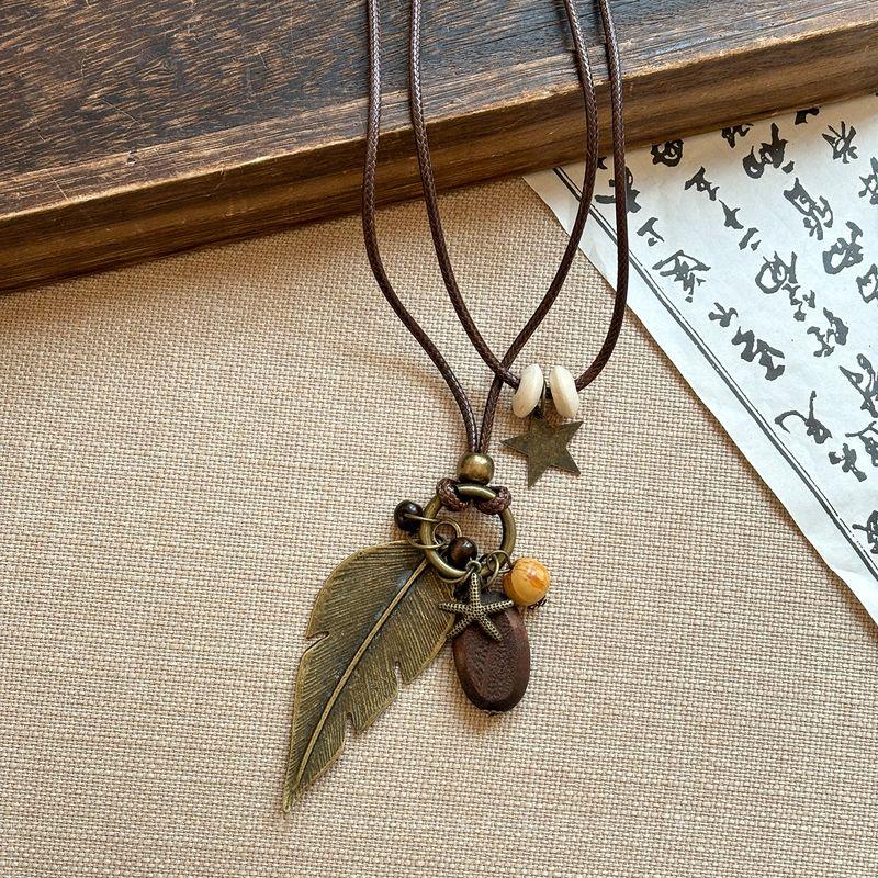 Crescent Smiling Face Wooden Ceramic Braided Rope Necklace Female Retro Ethnic Style Long Sweater Chain New Chinese Style Ornament