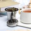 Stainless steel tea strainer with lid and teaspoon, foldable handle design
