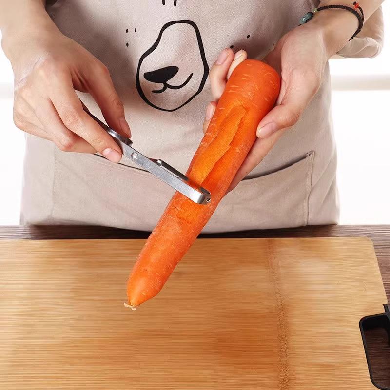 Stainless Steel Multifunctional Peeler: Ideal for Peeling Fruits, Melons, and Potatoes.