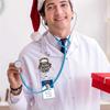 Serious Clark Christmas Badge Scroll with Retractable ID Holder for Nurses, Teachers, and Office Staff.
