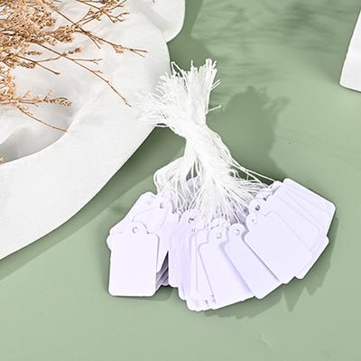 100 szt. Białe metki z cenami zawieszki do ekspozycji odzieży etykiety na towary na papier pakowy jubilerski