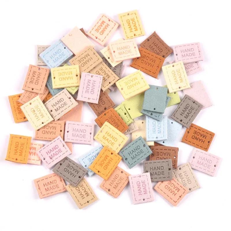 

20Pcs 2x1.6cm PU Cloth Handmade Embossed Tags DIY Flag Label for Garment Sewing Accessories Multipurpose Clothing Tags