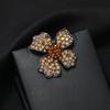 Niche design retro exquisite champagne crystal flower brooch temperament high-end corsage pin women's suit accessories trend