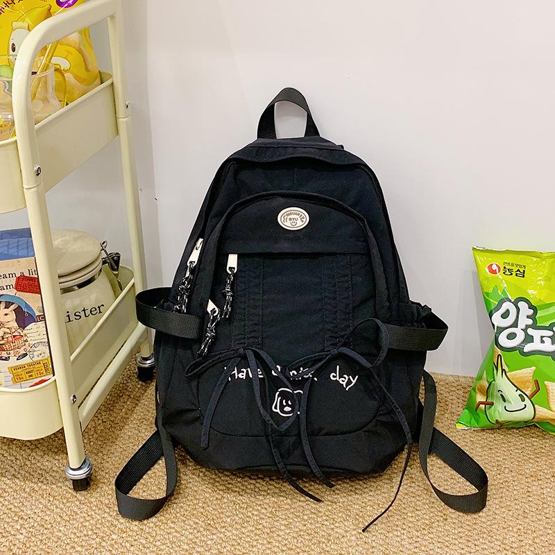 

Korean Leisure Student Schoolbag Female New Cute Large Capacity Nylon Cloth Bag Solid Color Small Fresh Computer Backpack. .