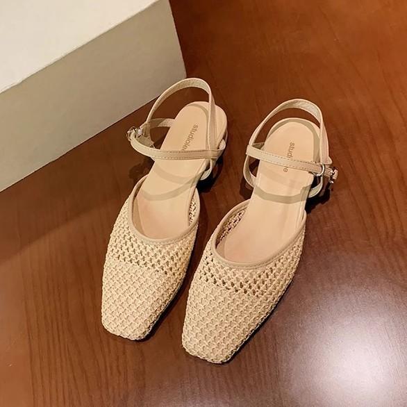 Design sense niche hollow woven bag head sandals women's summer new French rear air breathable low heel sandals